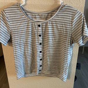 white and gray top with fake buttons
